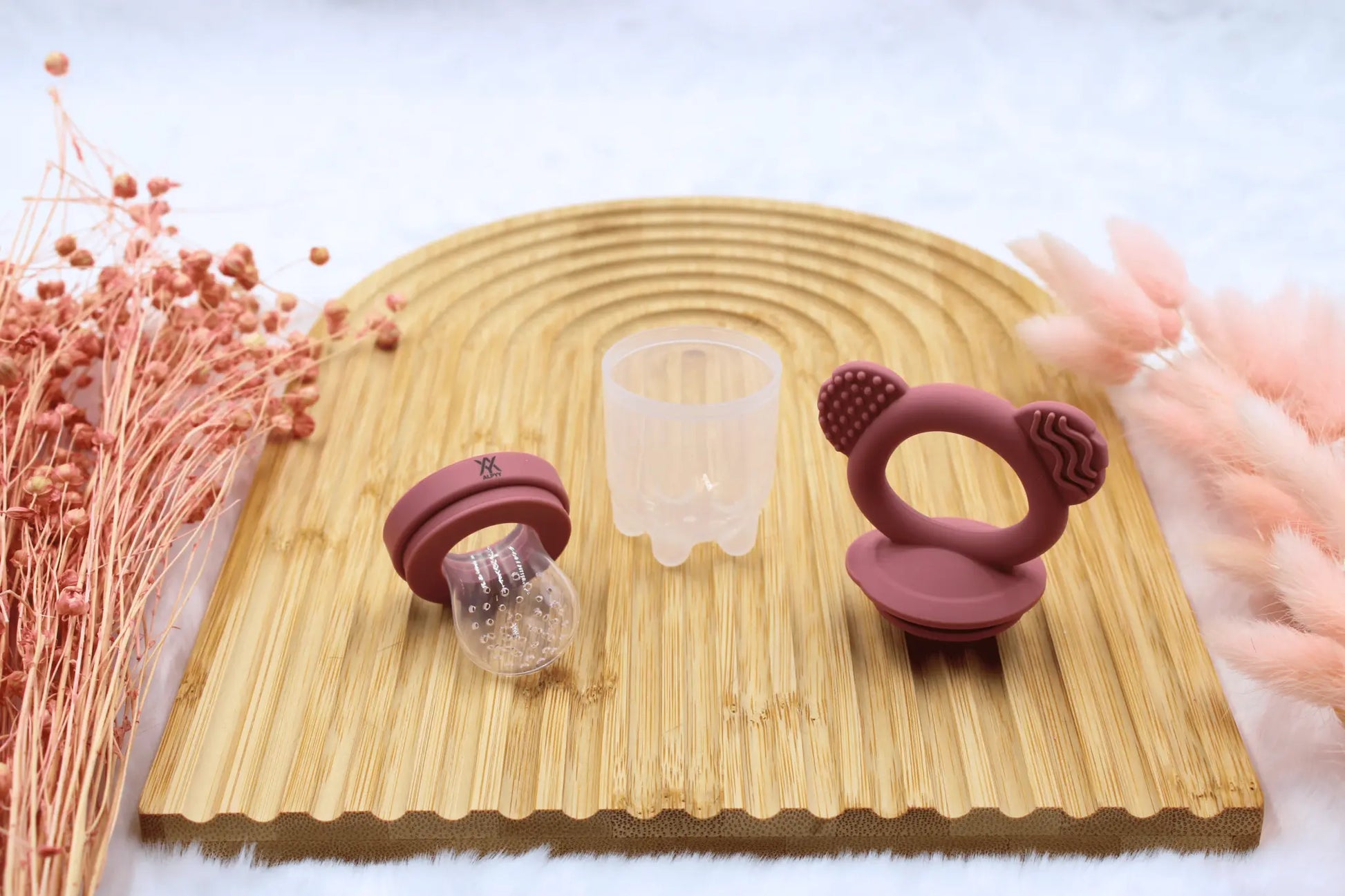 Fruchtsauger für Kinder in Rot mit Beißring