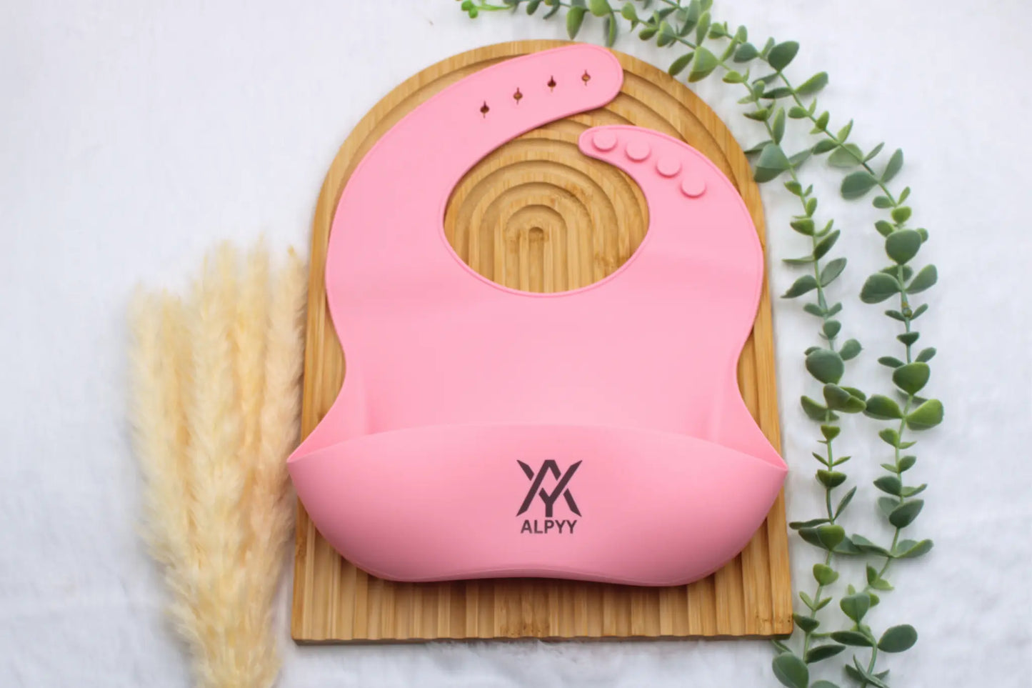 Lätzchen Silikon in Pink als flexibles Auffanglätzchen