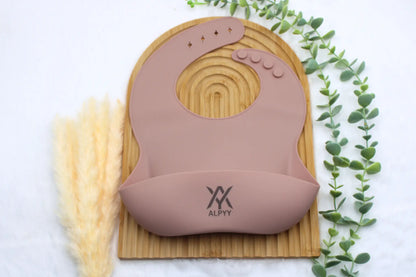 Rosa Lätzchen Silikon für Babys als hygienisches Auffanglätzchen